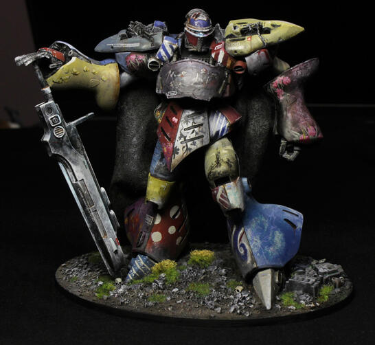 Mecha knight, painted with a wide variety of ornaments on individual armour panels.